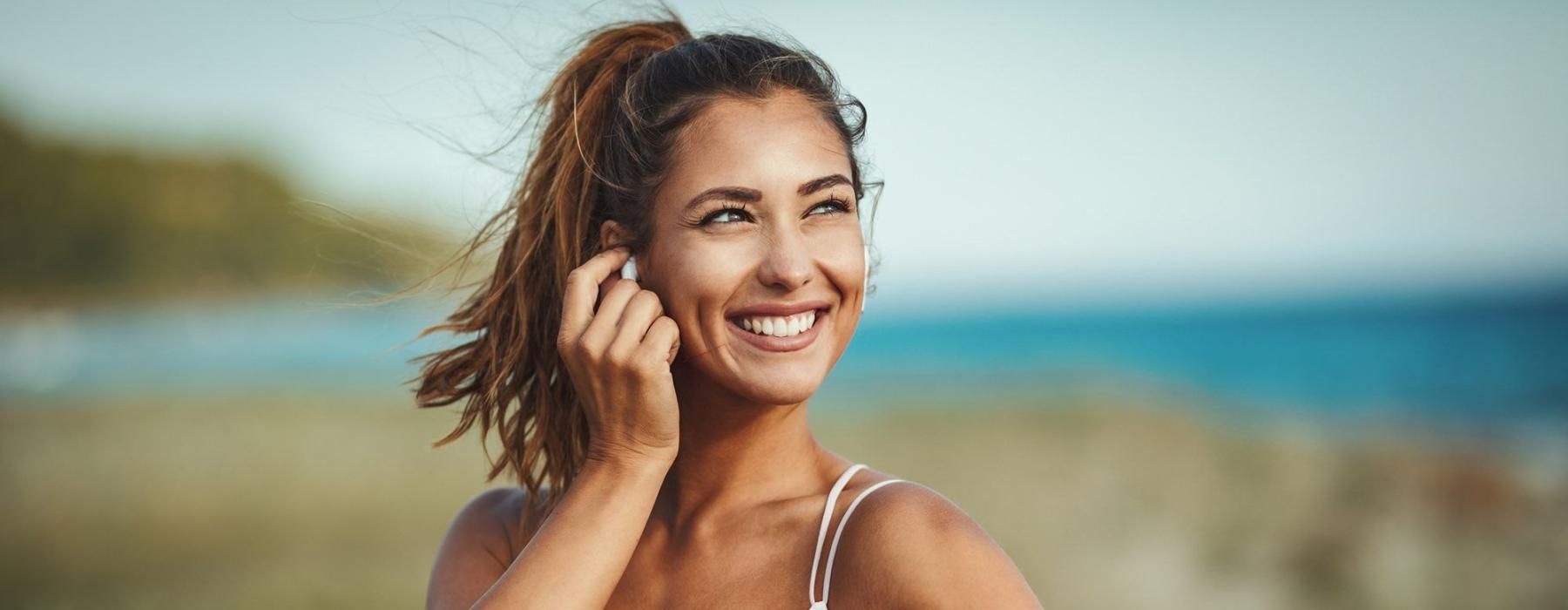 woman out for exercise at the beach